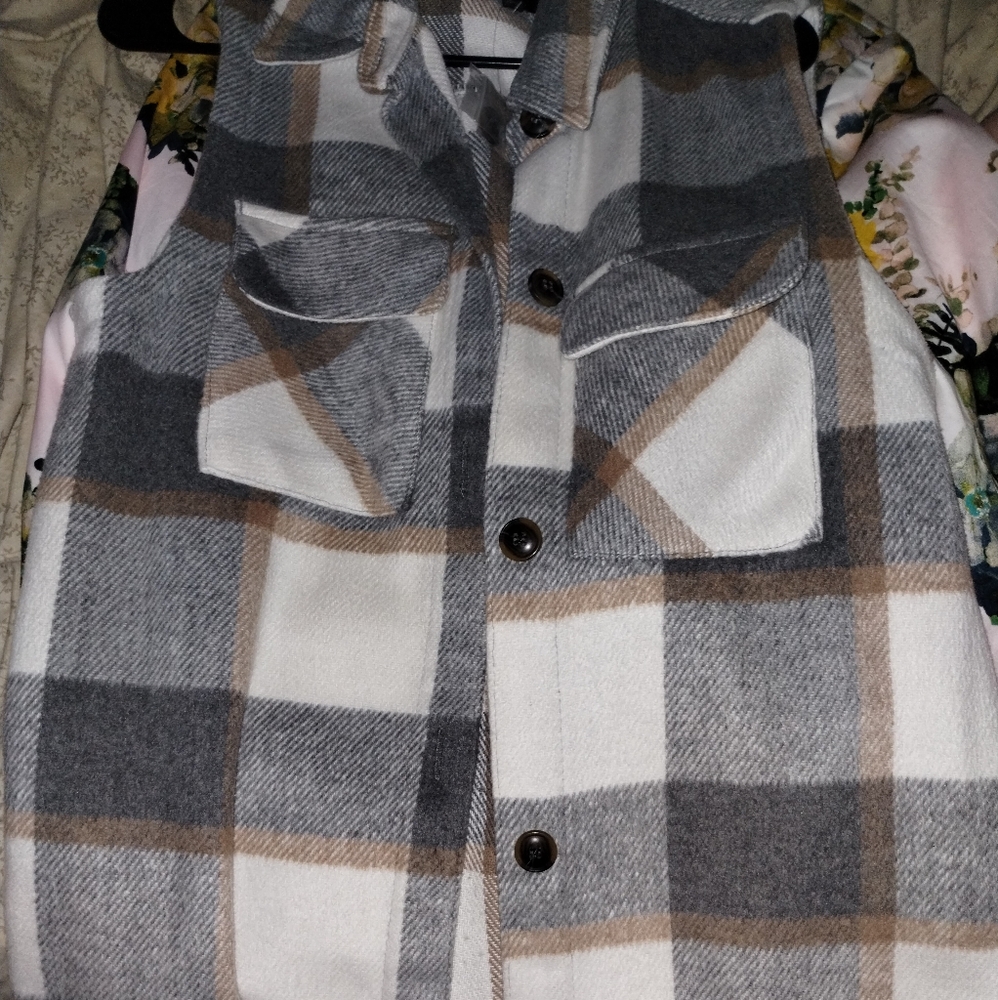 Long vest it's very much in style!
